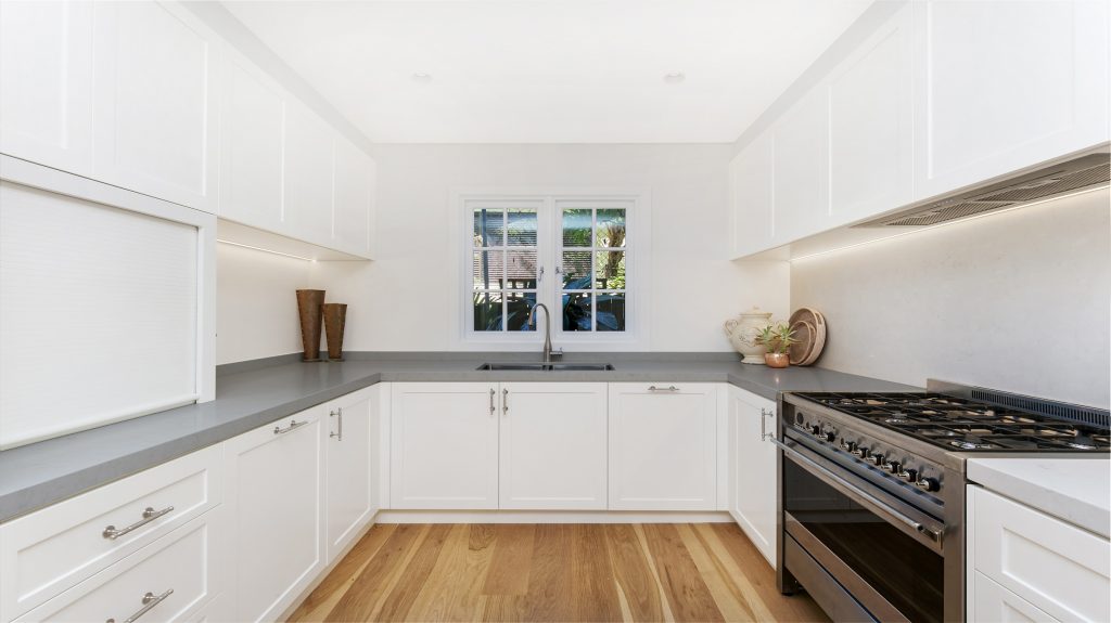 Collaroy Sydney, Satin Polyurethane Shaker Style kitchen with a Caesarstone Noble Grey benchtop