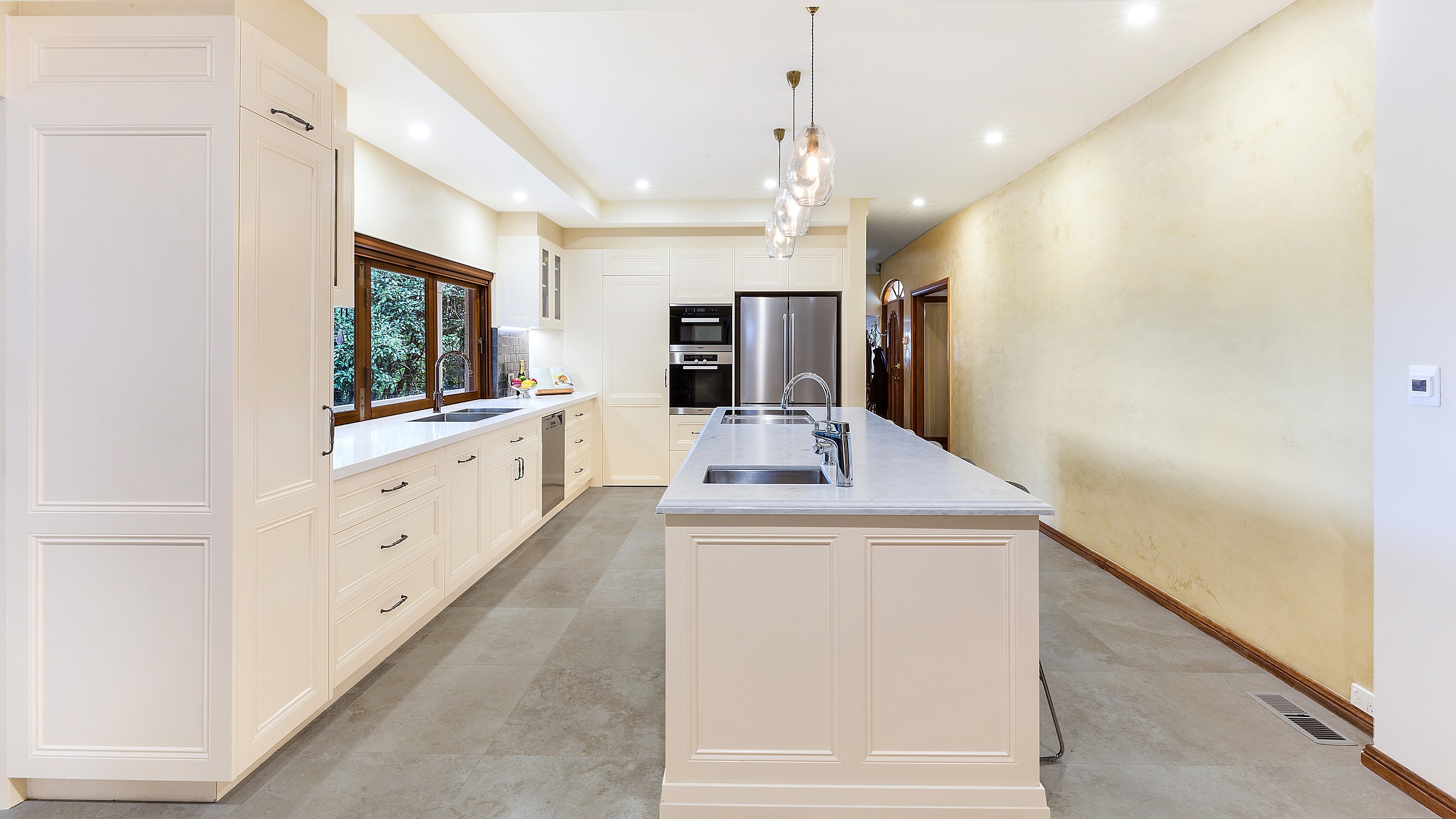 AFTER Epping Renovation - Provincial Style kitchen in a Satin Polyurethane finish with a Carrara Marble benchtop