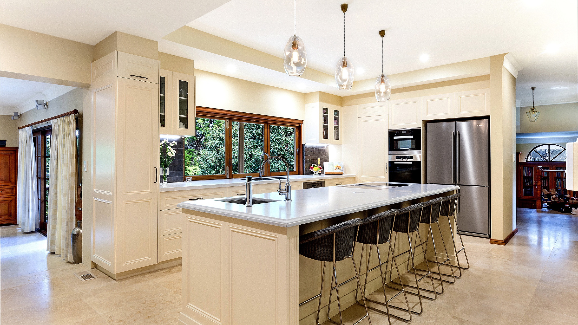 Epping, Provincial Style kitchen in a Satin Polyurethane finish with a Carrara Marble benchtop