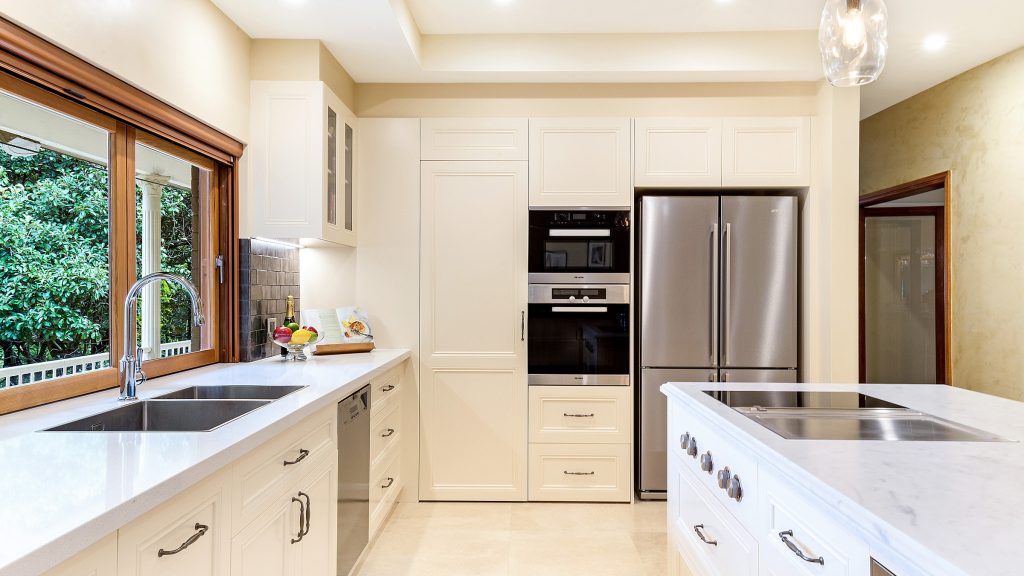 Epping, Provincial Style kitchen in a Satin Polyurethane finish with a Carrara Marble benchtop