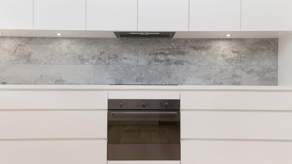North Manly Sydney, Polyurethane streamline modern kitchen with a Quantum Quartz benchtop