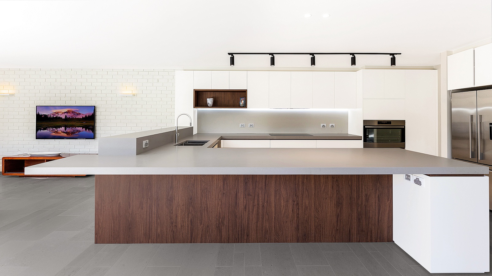Dover Heights Kitchen, Polyurethane and Likewood Timber Grain kitchen with a sleek concrete Caesarstone bench.