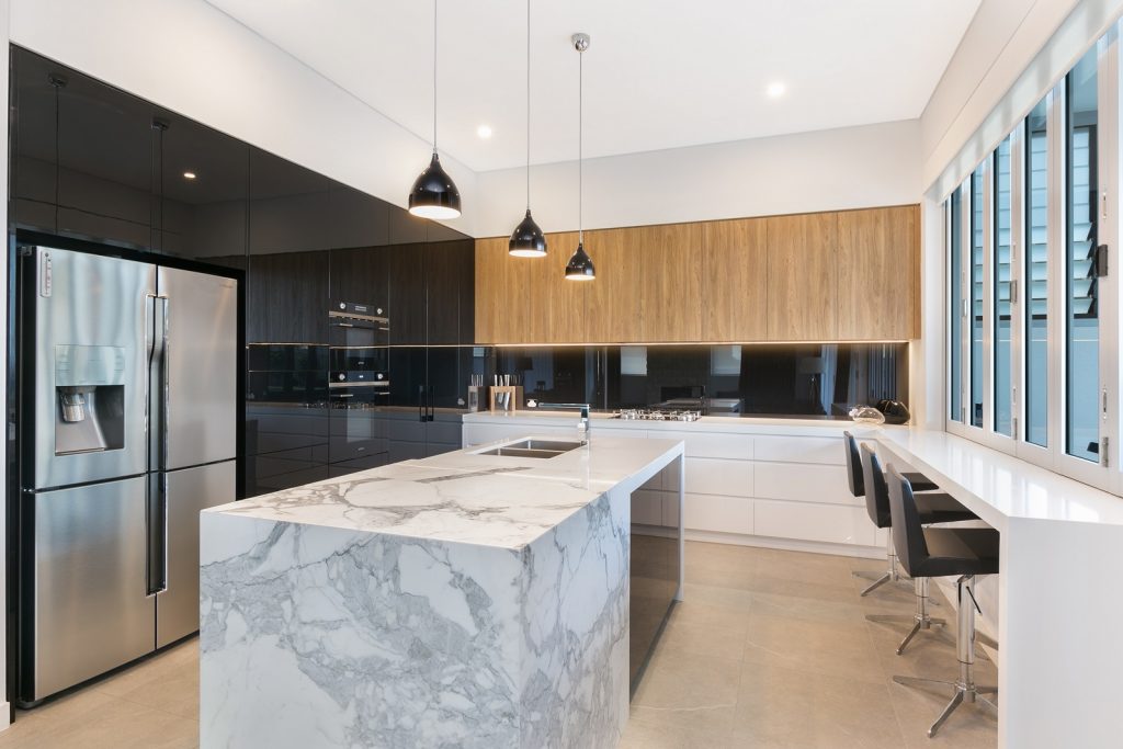 Guildford Sydney, Ultraglaze / Likewood kitchen with a feature island cube in a Calacutta Marble
