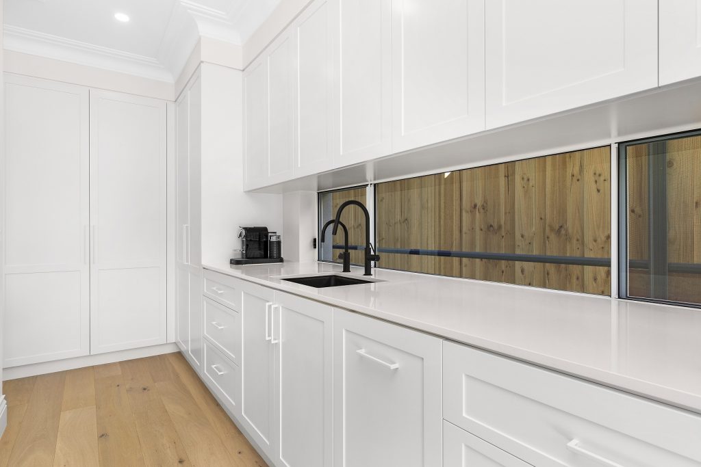 Kellyville, Polyurethane Shaker Style butler's pantry in Star White Doors and Quantum Quartz Alpine White benchtop
