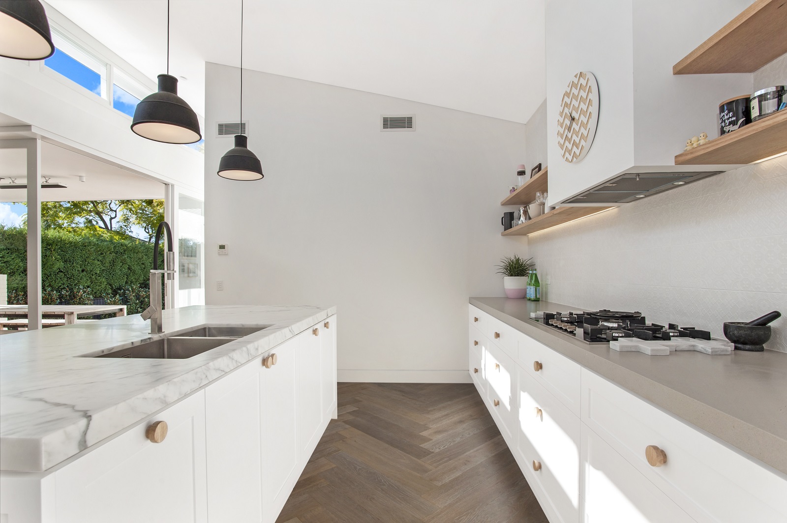 Northbridge Sydney, Satin Polyurethane Shaker Style kitchen with a Calacatta Marble Island Benchtop