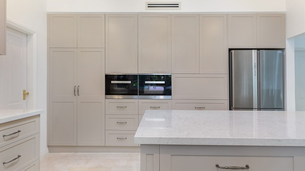Wahroonga Sydney, Satin Polyurethane Shaker Style kitchen with V-Groove feature panels and a Caesarstone benchtop