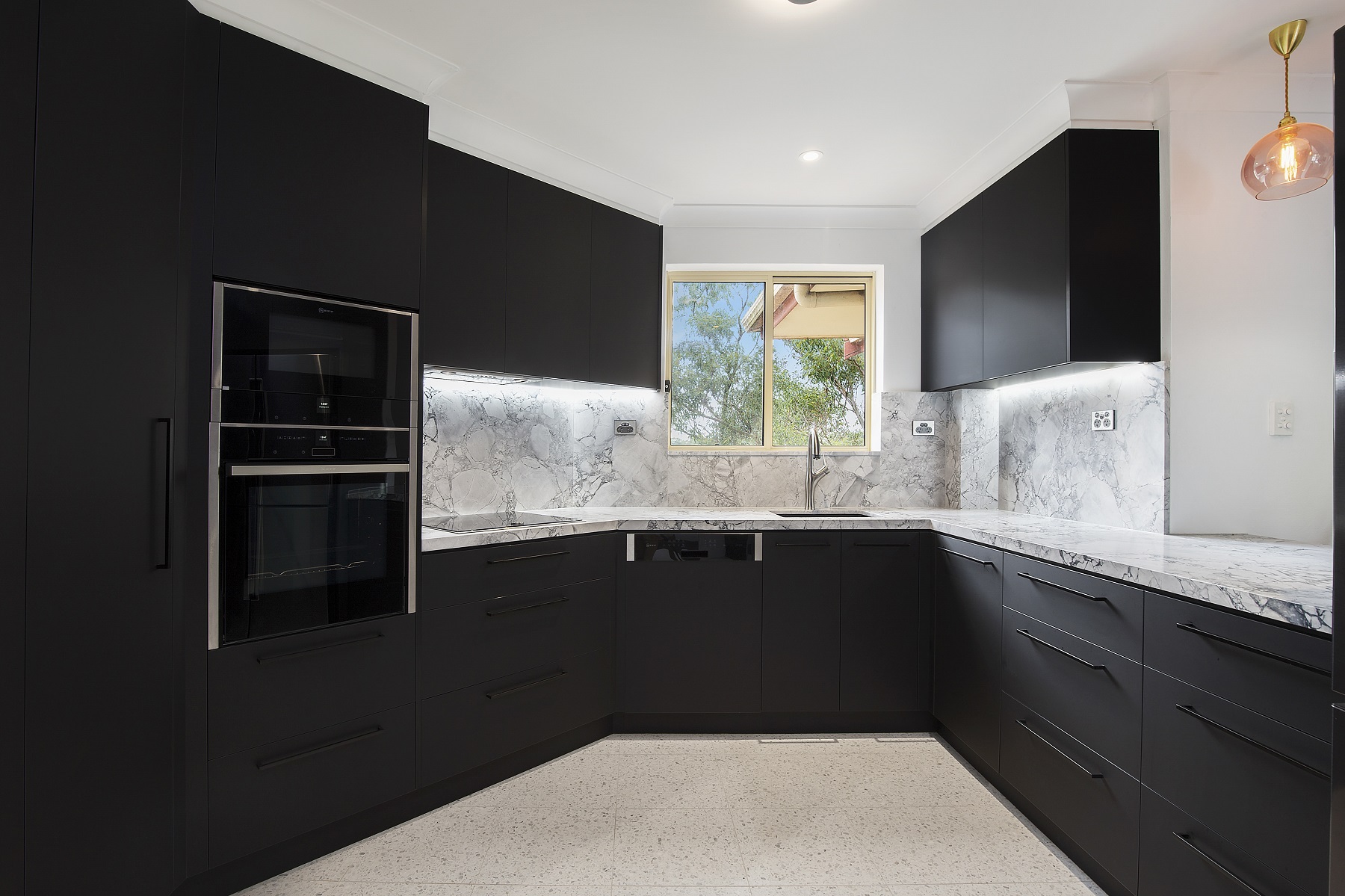 Miranda, Venette kitchen in Polytec Black with a 40mm Super White stone benchtop and splashback