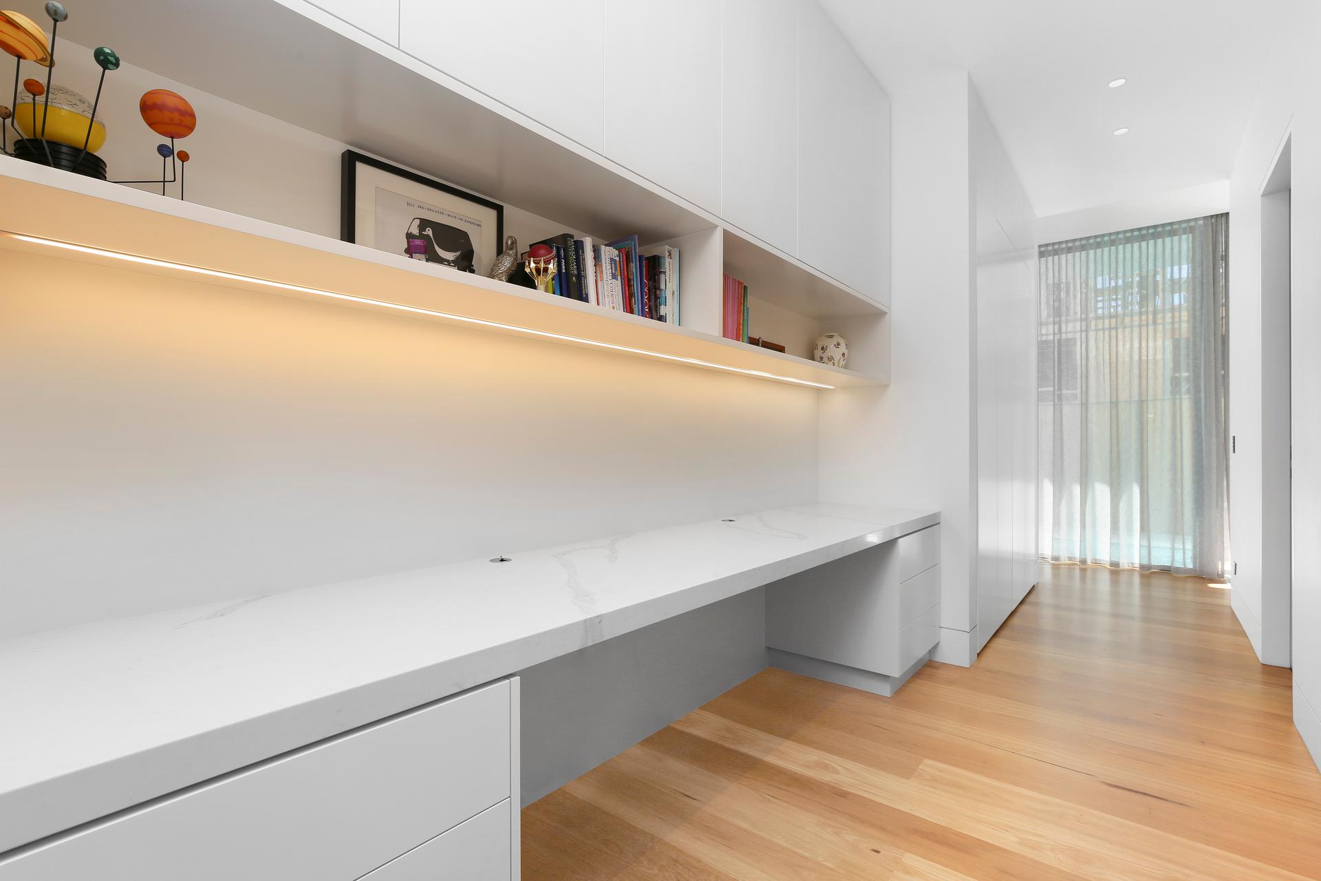 Polyurethane study desk with a stone benchtop and open shelving - Putney, Sydney