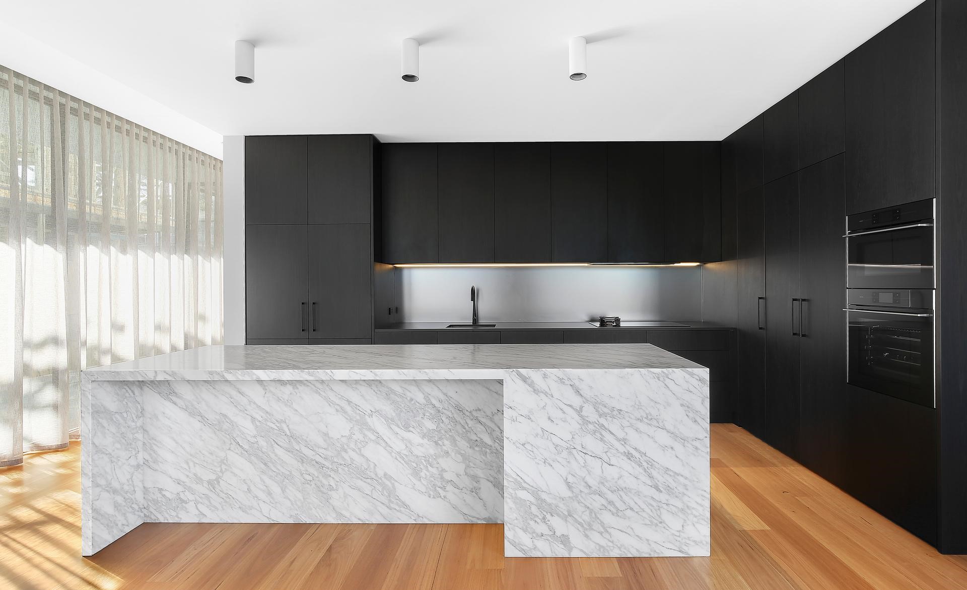 Veneer Polyurethane kitchen featuring a Carrara Marble Island bench with waterfall return - Putney, Sydney